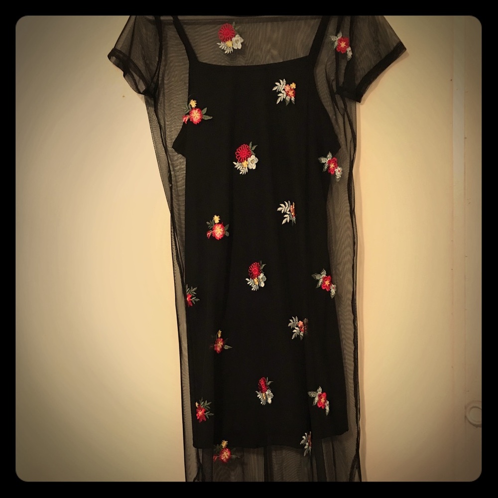 See through dress with black tank dress underneath